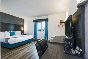 TV a/nebo společenská místnost v ubytování Comfort Hotel