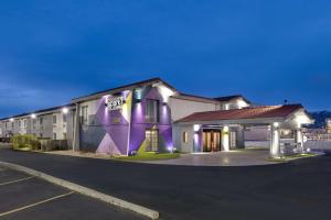 a building with a sign on the side of it at Spark by Hilton Rock Springs in Rock Springs