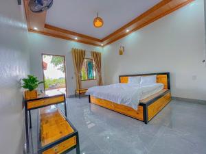 Giường trong phòng chung tại Trang An Natura Bungalow +54 ảnh