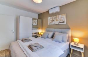 Postel nebo postele na pokoji v ubytování Apartman Mila