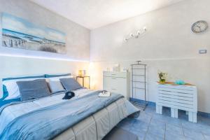 Postel nebo postele na pokoji v ubytování D R Holiday Home