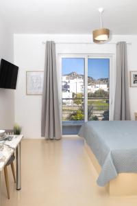 Μια τηλεόραση ή/και κέντρο ψυχαγωγίας στο Gaia Rooms