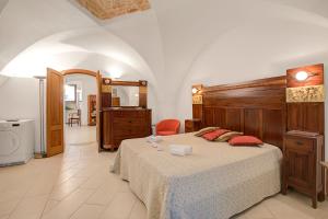 Postel nebo postele na pokoji v ubytování Bacco Apartment Noci - Happy Rentals