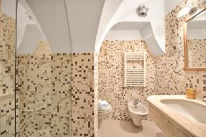 Koupelna v ubytování Bacco Apartment Noci - Happy Rentals