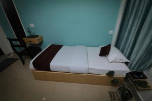 Postel nebo postele na pokoji v ubytování Hotel Eastern