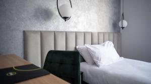 Łóżko lub łóżka w pokoju w obiekcie B&B HOTEL Piotrków Trybunalski