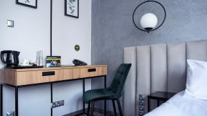Łóżko lub łóżka w pokoju w obiekcie B&B HOTEL Piotrków Trybunalski