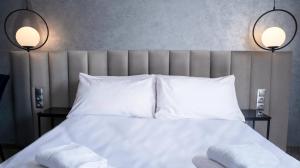 Łóżko lub łóżka w pokoju w obiekcie B&B HOTEL Piotrków Trybunalski