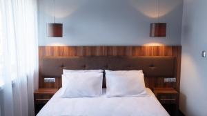 Łóżko lub łóżka w pokoju w obiekcie B&B HOTEL Piotrków Trybunalski