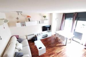 Posedenie v ubytovaní Townhouse with communal pool ideal for families