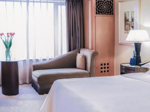 Postel nebo postele na pokoji v ubytování Sheraton Xi'an Hotel