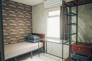 Ένα ή περισσότερα κρεβάτια σε δωμάτιο στο Koja CoLiving