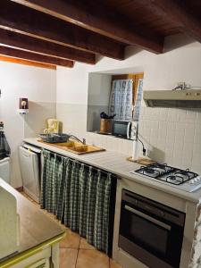 Кухня или мини-кухня в Jolie Gîte dans les Pyrénées
