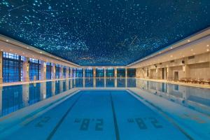 Bazén v ubytování Xiamen Aqua Resort nebo v jeho okolí