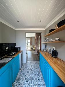 Η κουζίνα ή μικρή κουζίνα στο Blossom Cottage, Elgin Grabouw