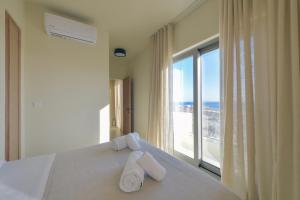 En eller flere senge i et værelse på carilia + 94 billeder