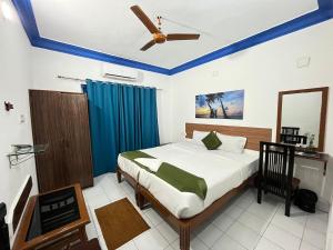 Dom Pedros Haven Resort - Tranquil Retreat by the Sea客房内的一张或多张床位