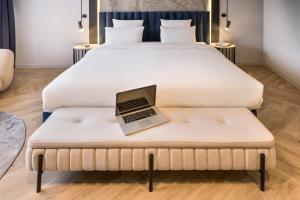 Postel nebo postele na pokoji v ubytování Mercure Sofia City