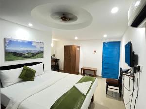 Dom Pedros Haven Resort - Tranquil Retreat by the Sea客房内的一张或多张床位