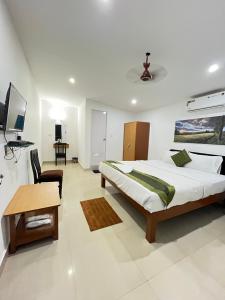 Dom Pedros Haven Resort - Tranquil Retreat by the Sea客房内的一张或多张床位