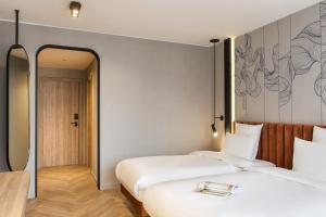 Postel nebo postele na pokoji v ubytování Mercure Sofia City