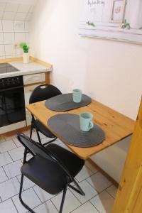 Köök või kööginurk majutusasutuses "Im Eichenhof" Whg 2 - idyllische Dorflage Nähe Grömitz! Jetzt mit WLAN!