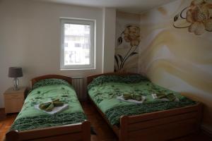 Letto o letti in una camera di Apartman Rastko