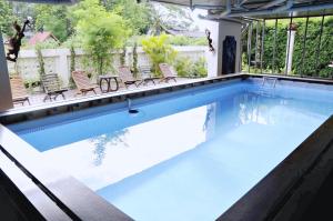 Bazén v ubytování Khuang Singh Residence & Hotel Chiangmai nebo v jeho okolí
