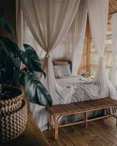 Postel nebo postele na pokoji v ubytování Jiva Bali - Nyan