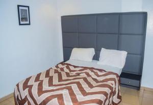 Postel nebo postele na pokoji v ubytování Cozy apartment en-suite