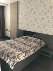 Ένα ή περισσότερα κρεβάτια σε δωμάτιο στο ketis sweet home
