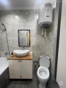 Vannituba majutusasutuses ЖК Найзатас 2 комнатная