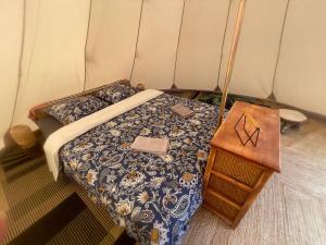 Ένα ή περισσότερα κρεβάτια σε δωμάτιο στο Chalet au cœur de la nature