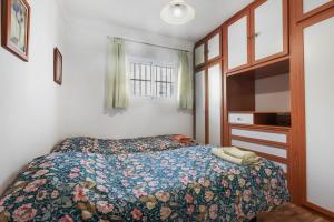 Ένα ή περισσότερα κρεβάτια σε δωμάτιο στο Apartamento primerísima linea playa