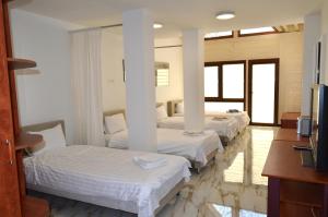 Ένα ή περισσότερα κρεβάτια σε δωμάτιο στο Hotel Tomce Sofka