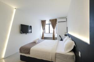 Postel nebo postele na pokoji v ubytování Loft 82
