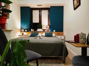 Ένα ή περισσότερα κρεβάτια σε δωμάτιο στο Willa Pod Basztą Restauracja&Wellness