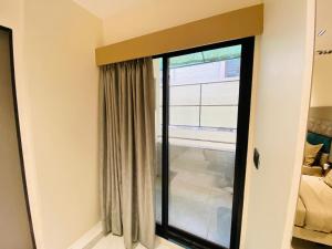 Letto o letti in una camera di Hotel RV Residency