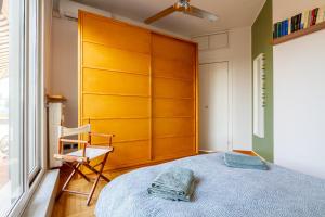 Posteľ alebo postele v izbe v ubytovaní attico con terrazzo navigli bocconi - NavigliApartments + 19 fotografií