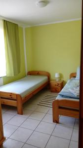 Postel nebo postele na pokoji v ubytování Ferienwohnung Zaepernick Erdgeschoss