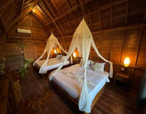 Kubu Bakas Guest House客房内的一张或多张床位