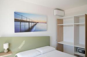 Postel nebo postele na pokoji v ubytování Panta Rei Charme Suite