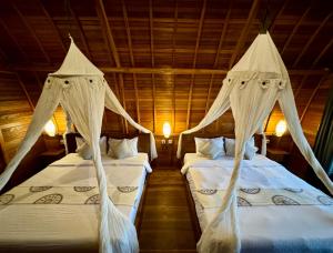 Kubu Bakas Guest House客房内的一张或多张床位