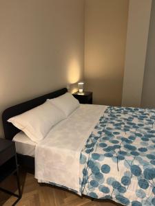 Katil atau katil-katil dalam bilik di Easy Room Italy City Life