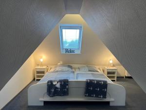 Postel nebo postele na pokoji v ubytování Greggersen - Whg 2