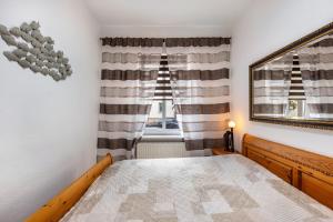 Postel nebo postele na pokoji v ubytování Fewo am Georgengarten - Wohnung 2