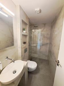 Koupelna v ubytování Hotel Tassos-Despina