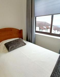 Ένα ή περισσότερα κρεβάτια σε δωμάτιο στο Ocean Front TWIN Rooms