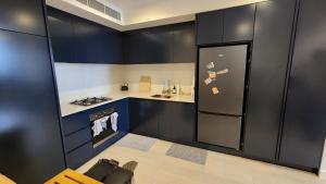 Η κουζίνα ή μικρή κουζίνα στο Cozy and Modern 1 Bedroom in Hurstville