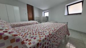 Letto o letti in una camera di Casa in Piazza
